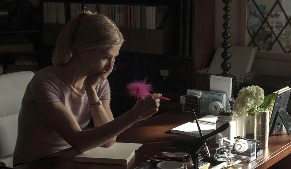 Amy writing in her diary in the film