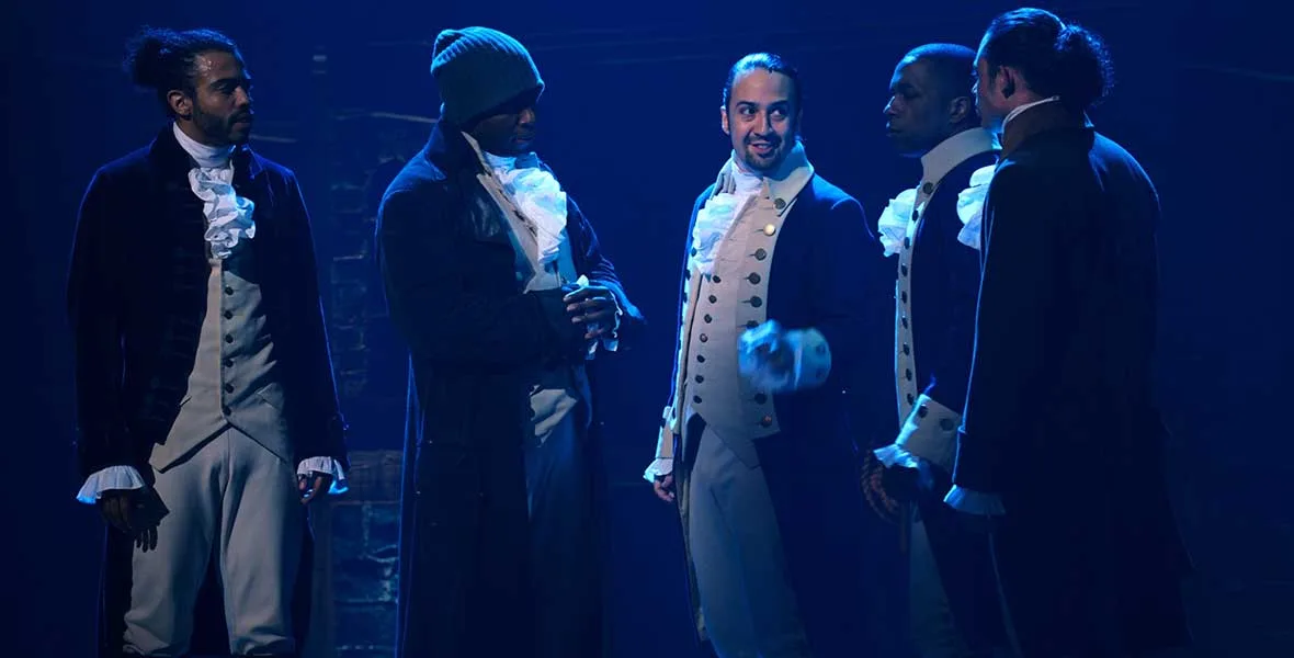 The Hamilton company on stage in the filmed production