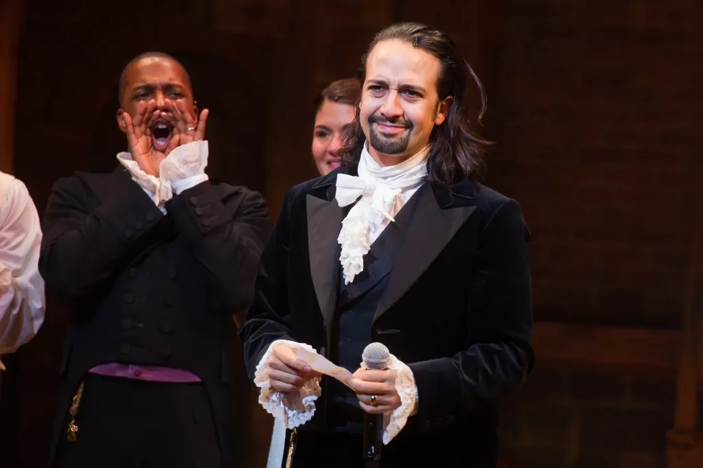 Lin-Manuel Miranda with the Hamilton cast on stage