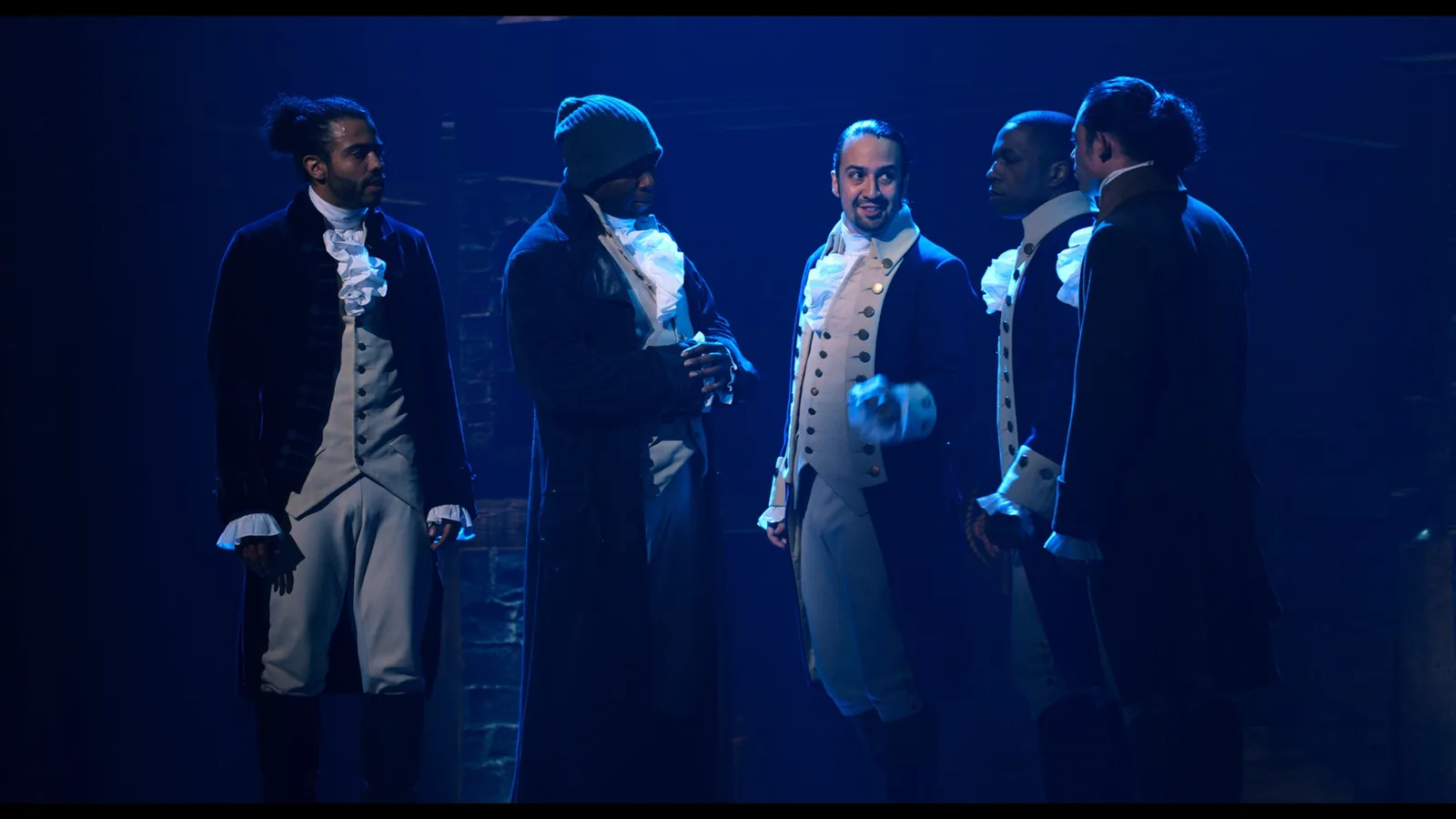 The Hamilton company on stage in the trailer