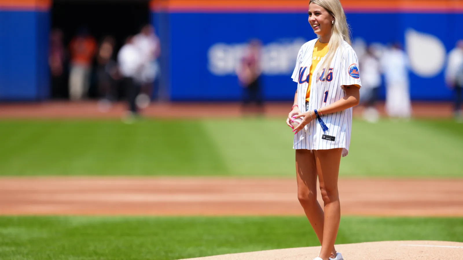 Haliey Welch throws out the first pitch during the game between the Oakland Athletics and the New York Mets at Citi Field on Thursday, August 15, 2024 in New York, New York. (Photo by Mary…