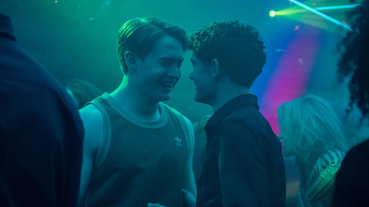 Nick and Charlie in a nightclub scene.