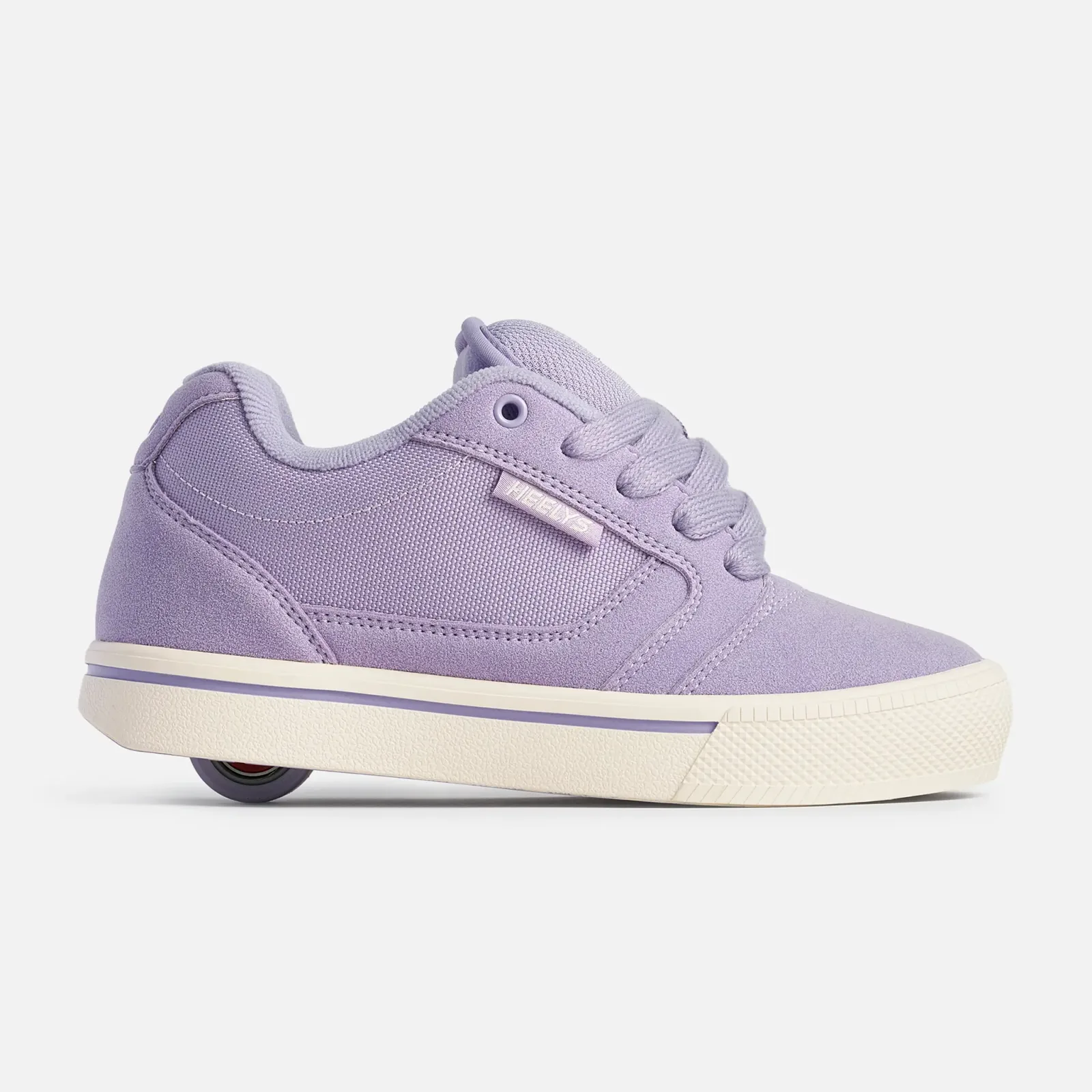 Current Heelys Pro 25 wheeled sneaker in purple and cream; this is not the original launch model.