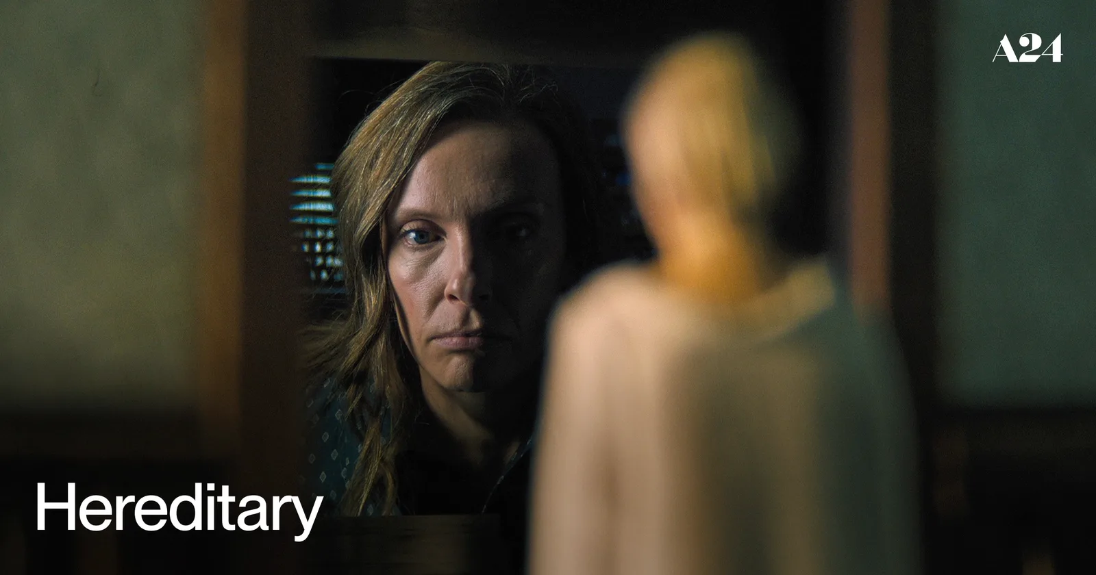 Toni Collette in a frame from A24's Hereditary trailer.