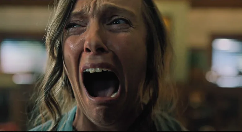 Toni Collette screaming in a scene from Hereditary.