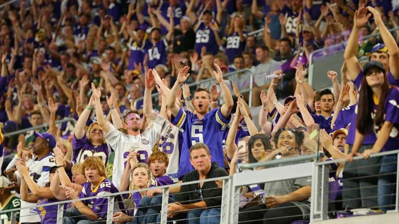 Minnesota Vikings fans perform the Skol chant