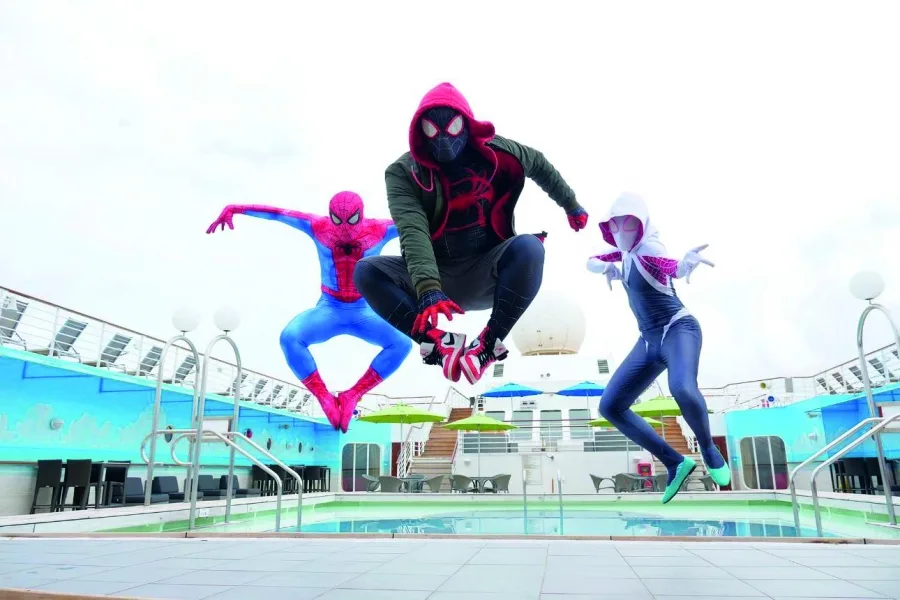 Spider-Gwen, Miles and Peter leaping together in campaign art