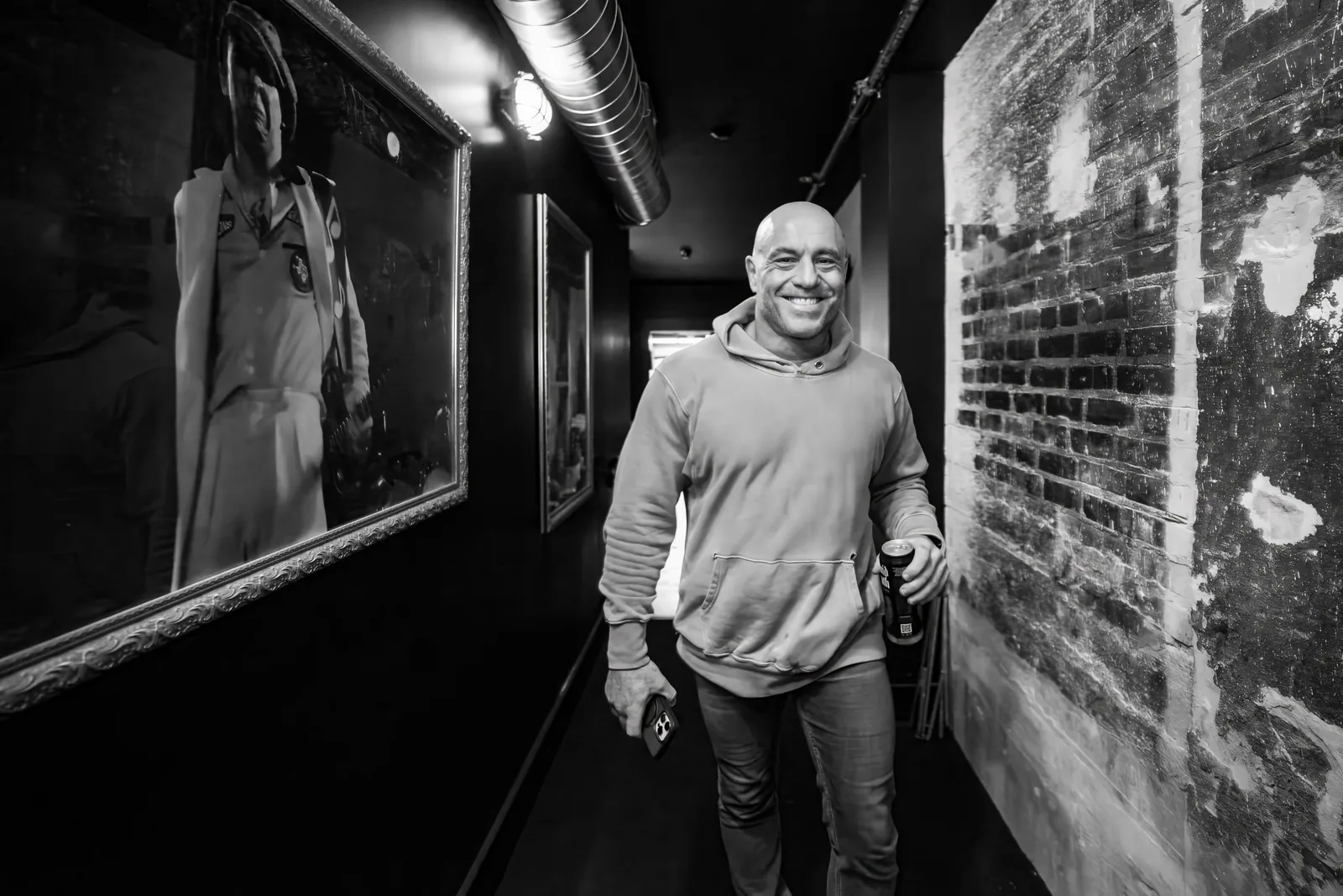 Joe Rogan walking a hallway, from Spotify's 2024 renewal announcement.