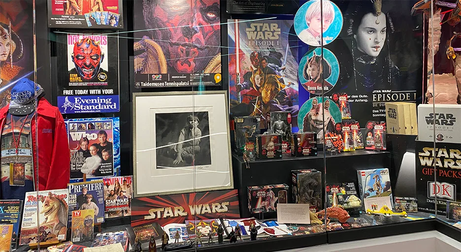 Phantom Menace memorabilia and LEGO sets on display