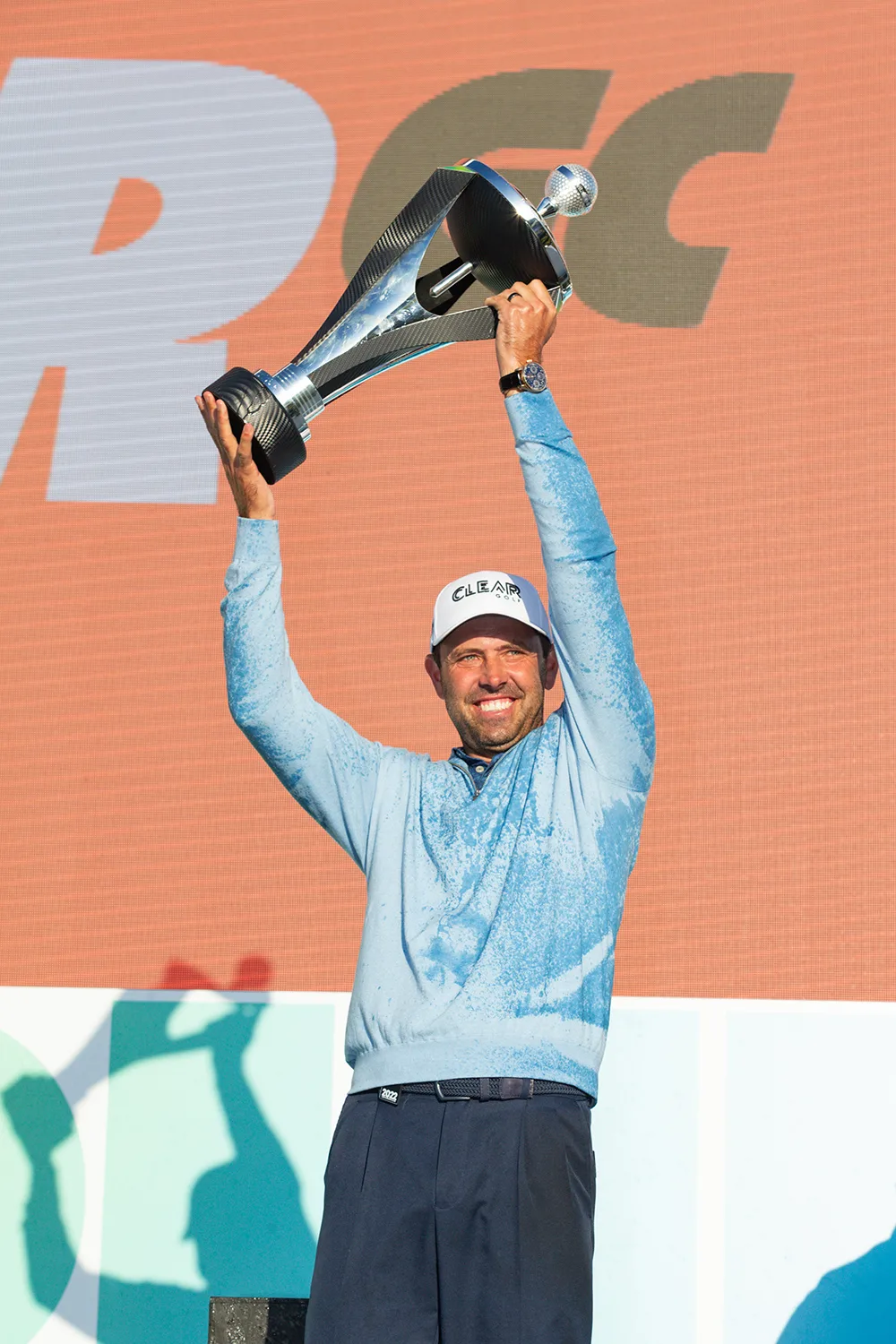 Charl Schwartzel with the trophy after winning the inaugural LIV Golf tournament in London in 2022.
