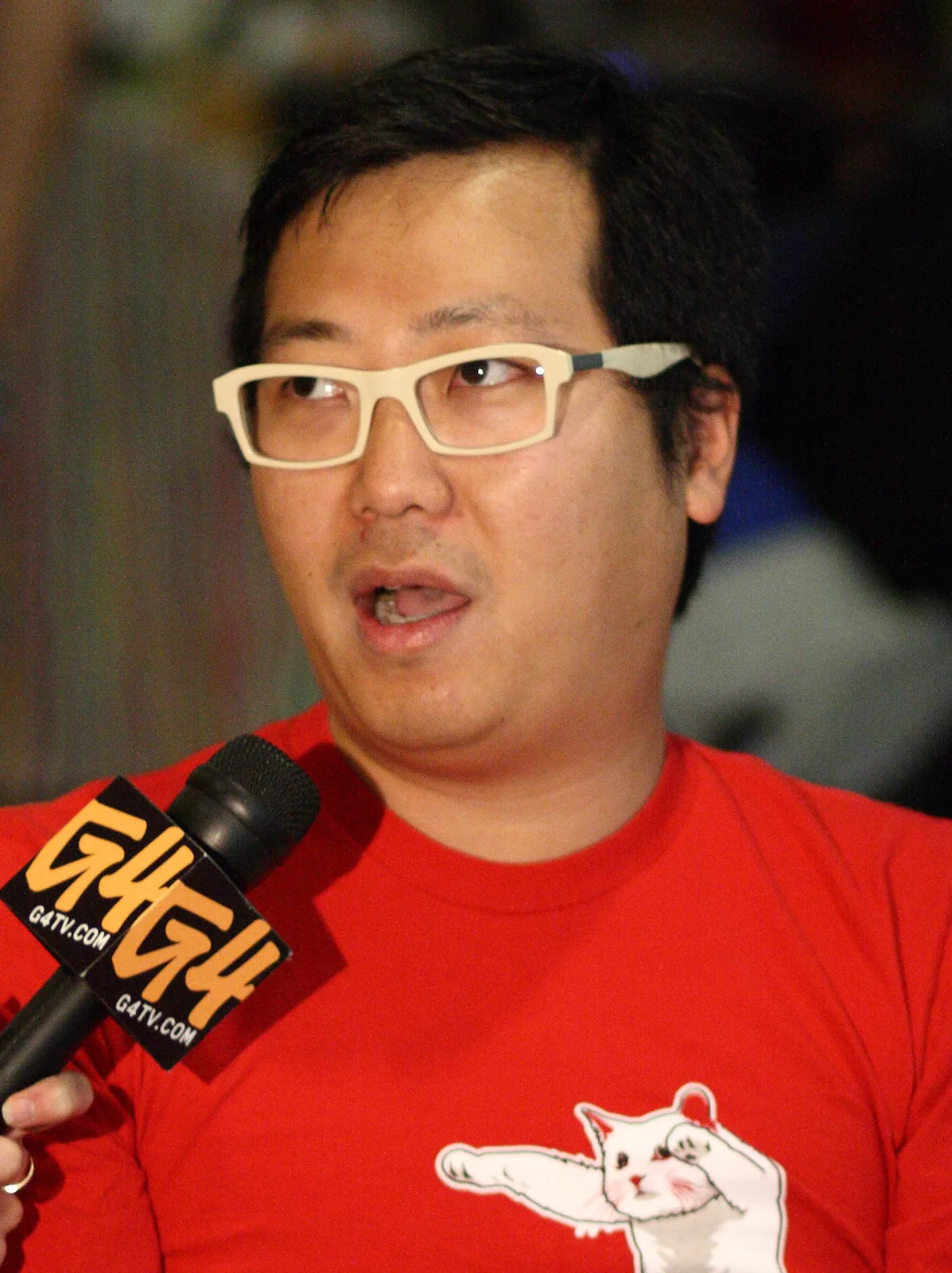 Ben Huh, owner of I Can Has Cheezburger? , being interviewed by a G4 journalist at ROFLCon II