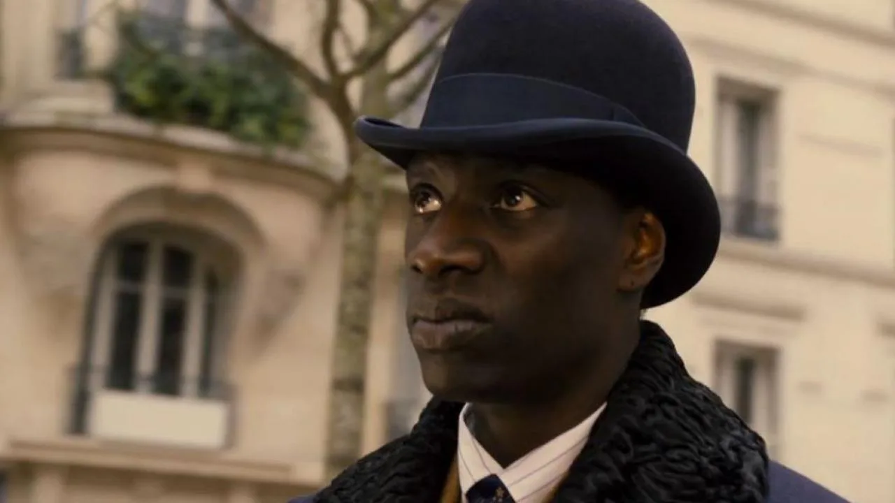Omar Sy as Assane Diop in a bowler hat in Lupin