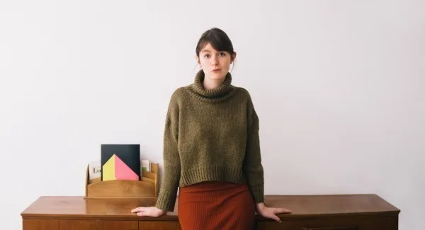 Sally Rooney in a green sweater