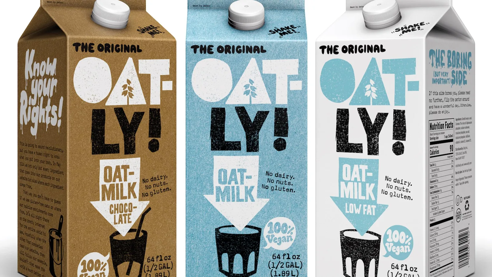 Three Oatly oat milk cartons