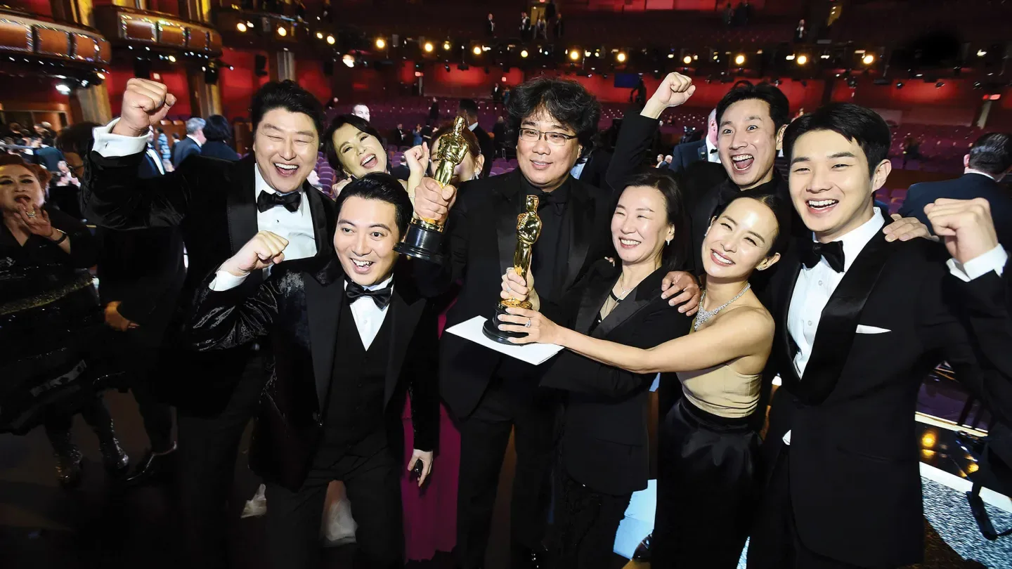 Director Bong Joon Ho (wearing glasses) and the Parasite team celebrated the film’s four wins (including best picture) at the 92nd Academy Awards on Feb. 9, 2020, at the Dolby Theatre.
