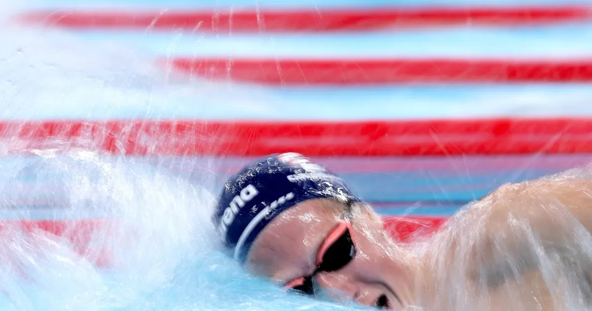 Christiansen racing in the pool