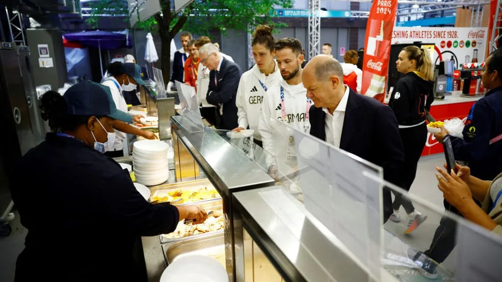Diners at the Olympic Village food hall, Paris 2024