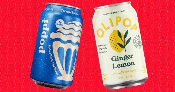 A Poppi can beside an Olipop can