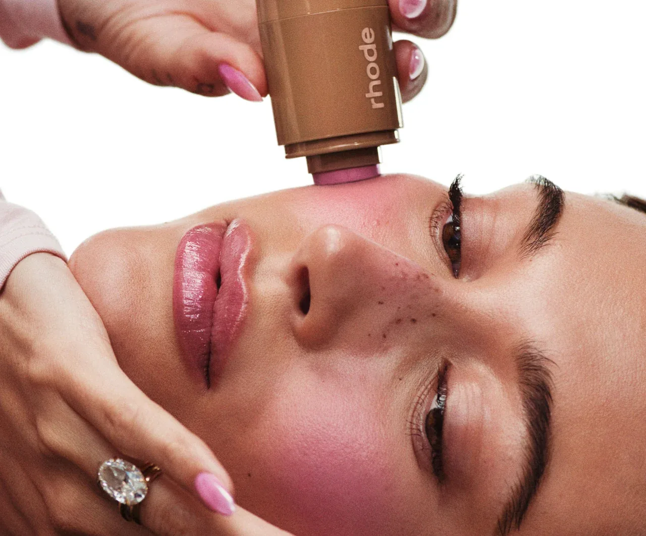 Official campaign image showing Pocket Blush in Piggy applied to cheeks.