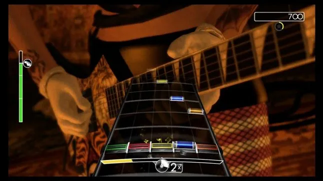 Original Rock Band gameplay screenshot accompanying lead designer Rob Kay’s first-person development postmortem.