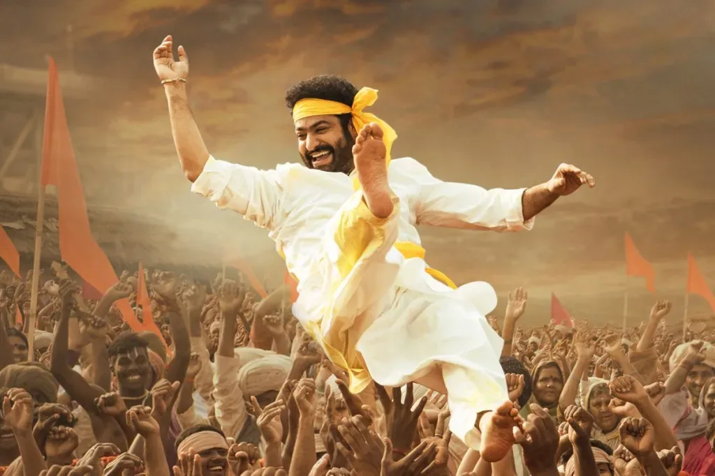 N. T. Rama Rao Jr. leaping above a crowd in RRR.