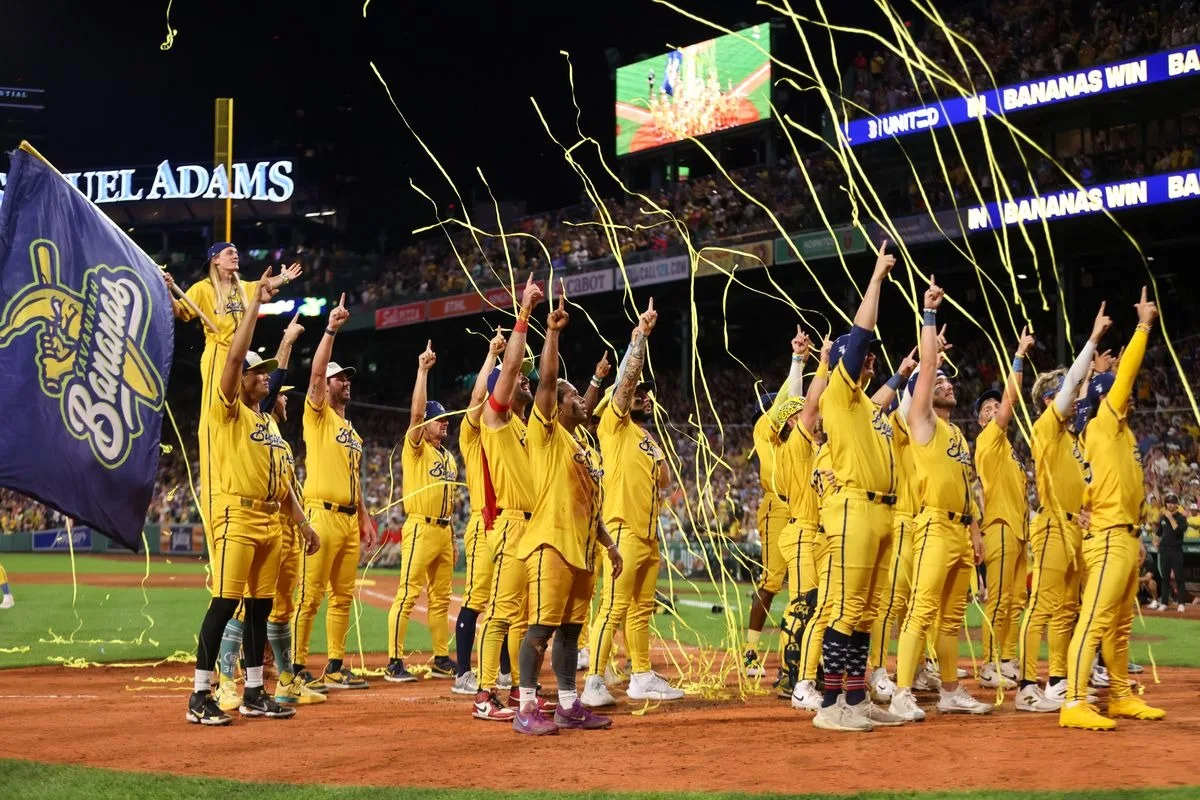 The Bananas celebrate under confetti
