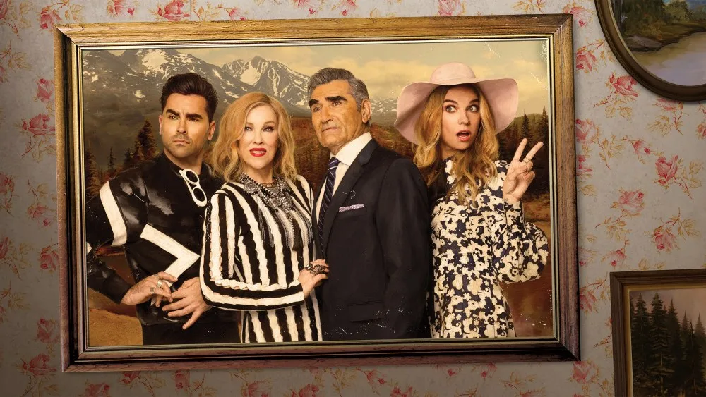 The Rose family in a gilded frame, from the show's promotional art.