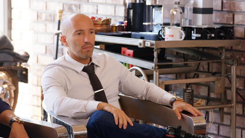 Jason Oppenheim at his desk in Selling Sunset