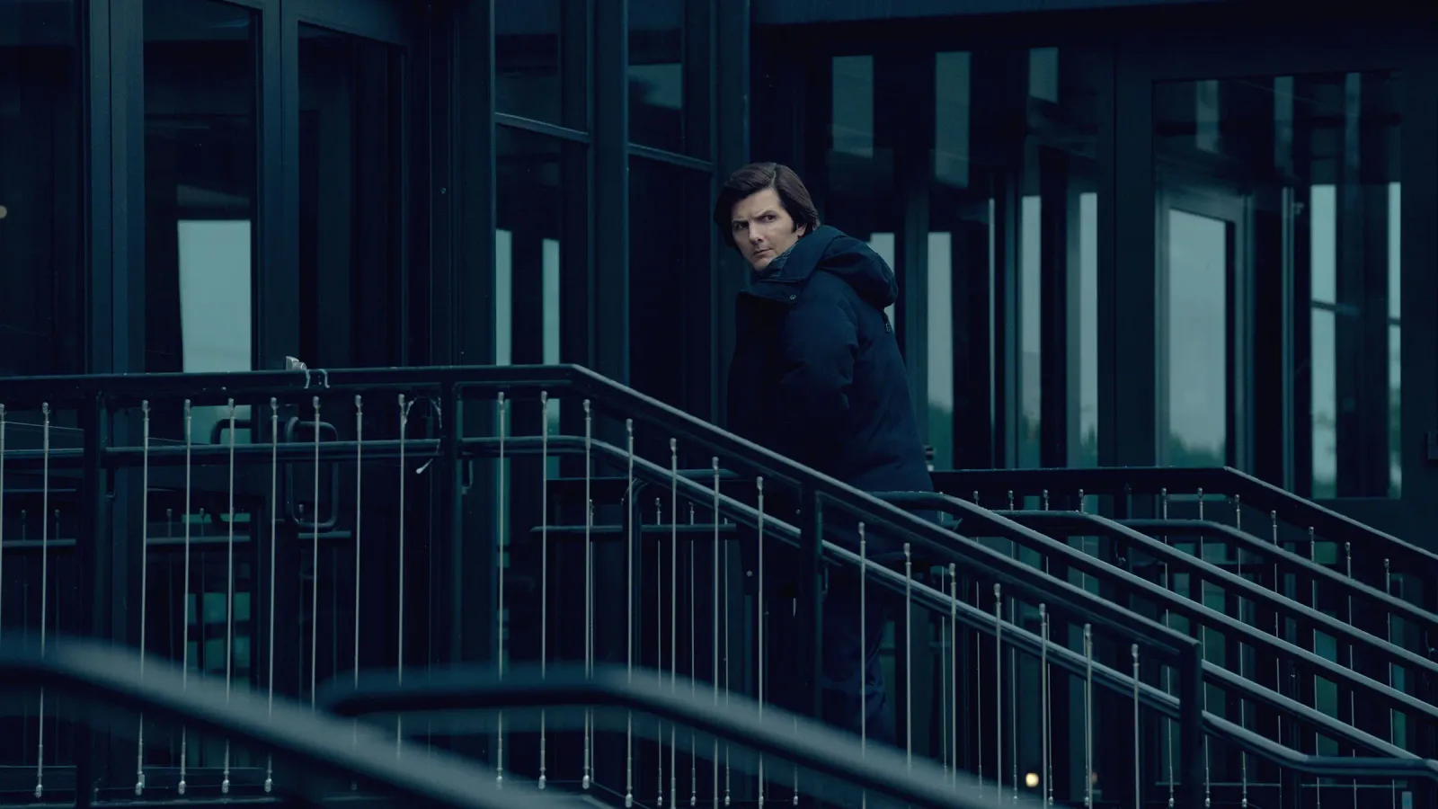 Mark on a dark Lumon stairwell, season 2