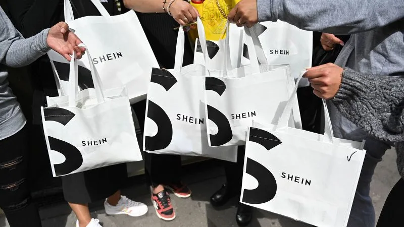 Shoppers carrying Shein bags