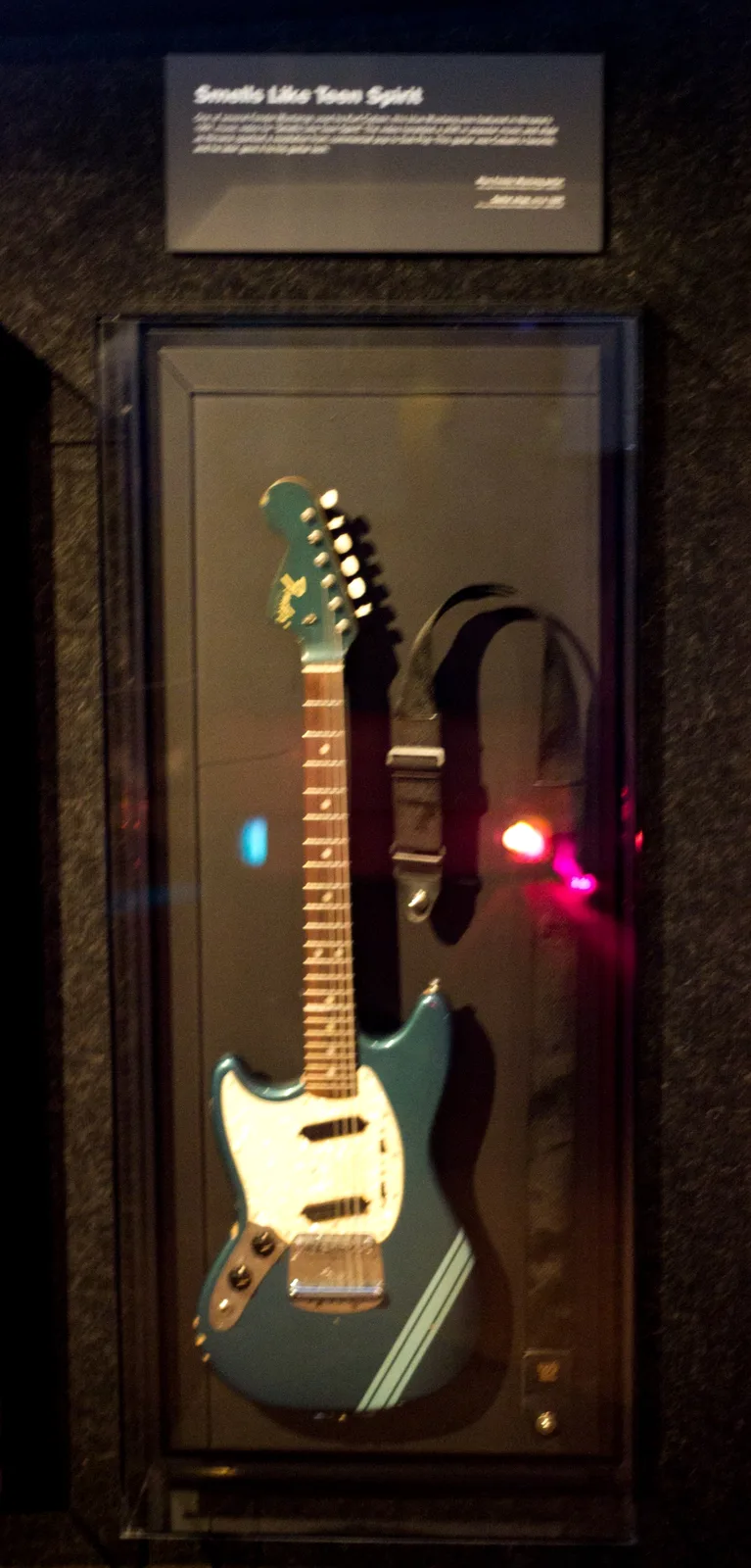 Kurt Cobain’s Smells Like Teen Spirit guitar at the EMP Museum; photograph by Razvan Orendovici, CC BY 2.0.