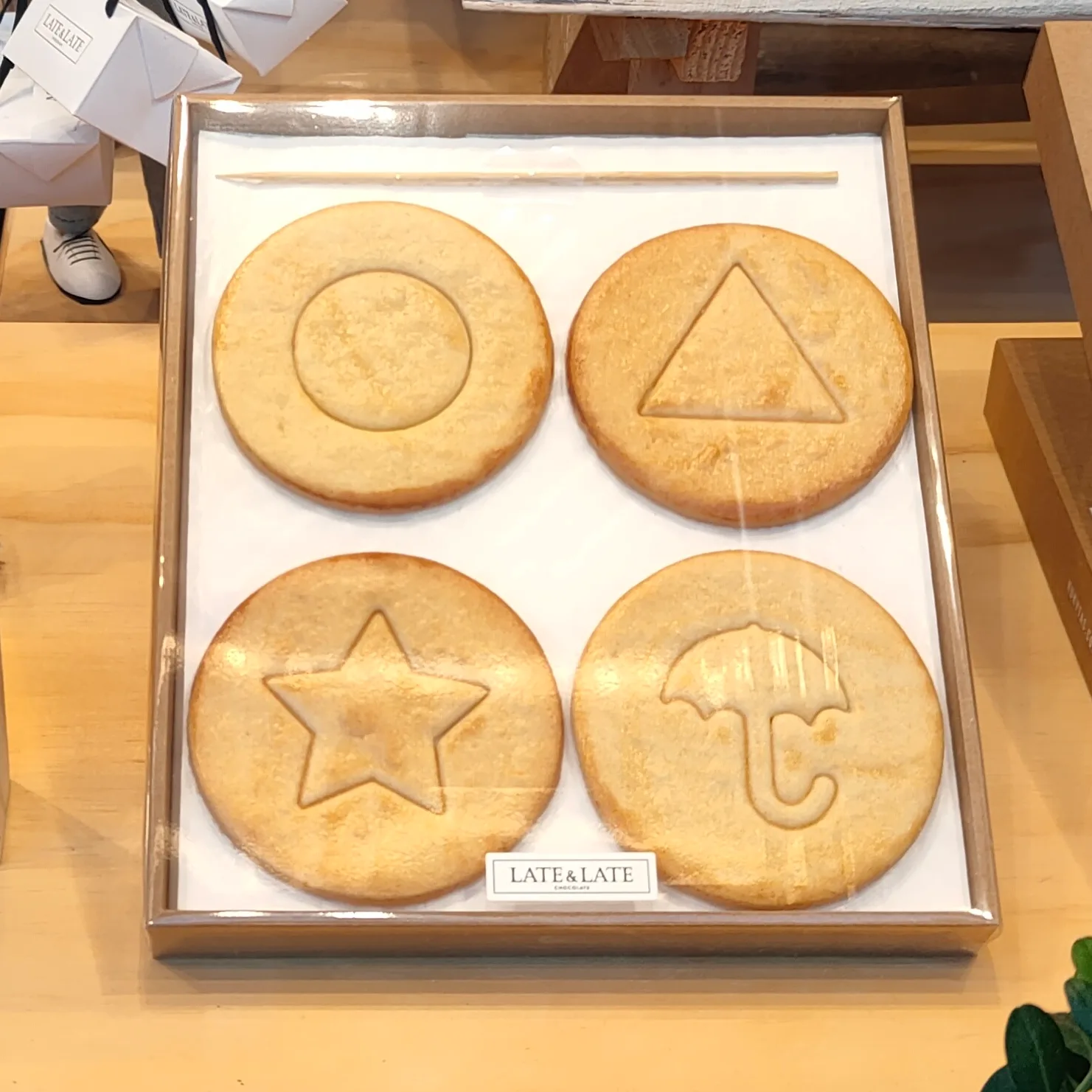 Dalgona candies bearing shapes from the show, photographed in Spain on October 21, 2021; CC BY-SA 4.0.