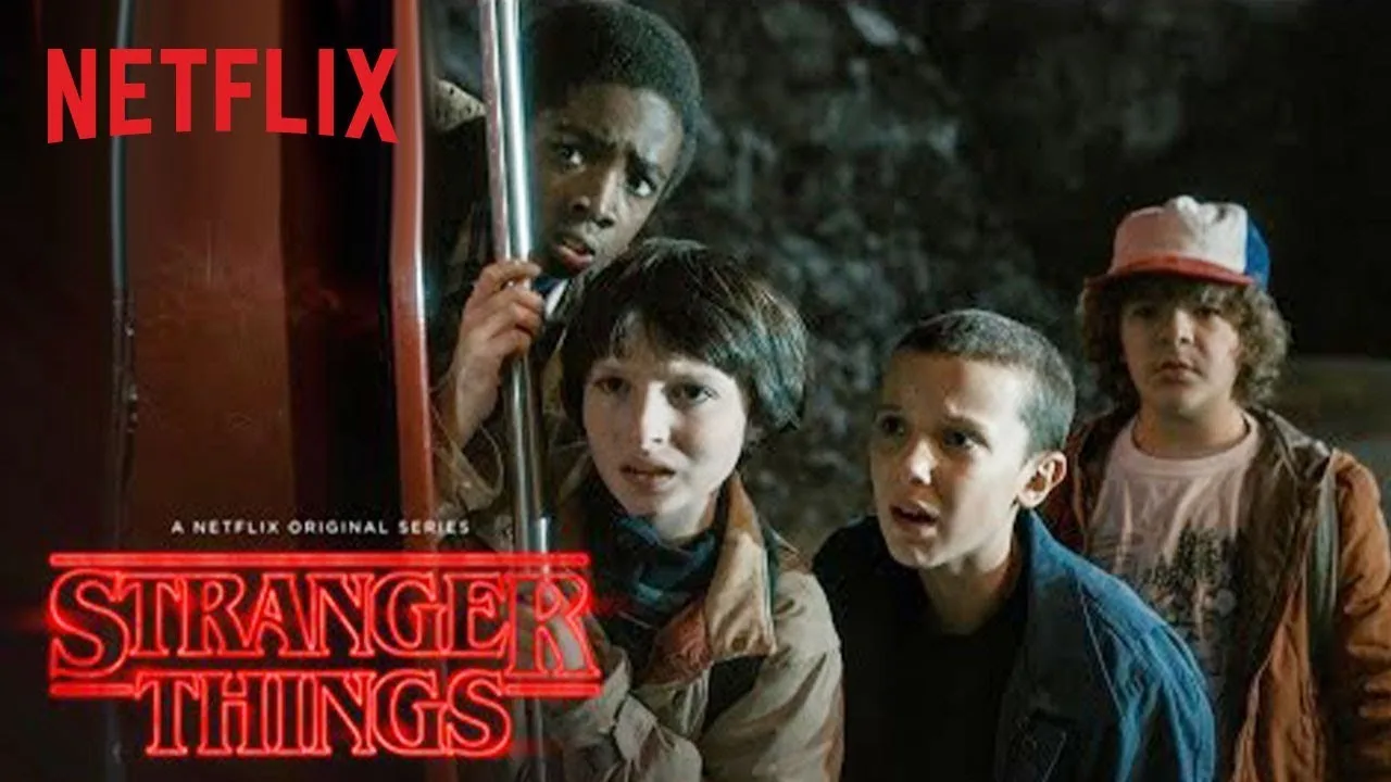 Stranger Things key art: the boys and Eleven under the red title.