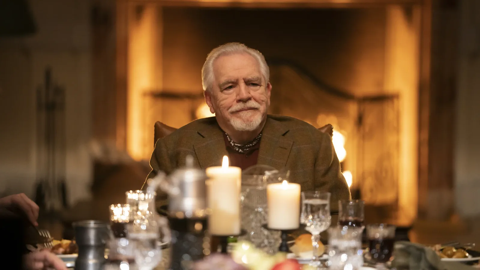 Brian Cox as Logan Roy at a candlelit dinner