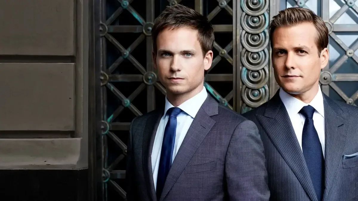 Patrick J. Adams and Gabriel Macht as Mike and Harvey