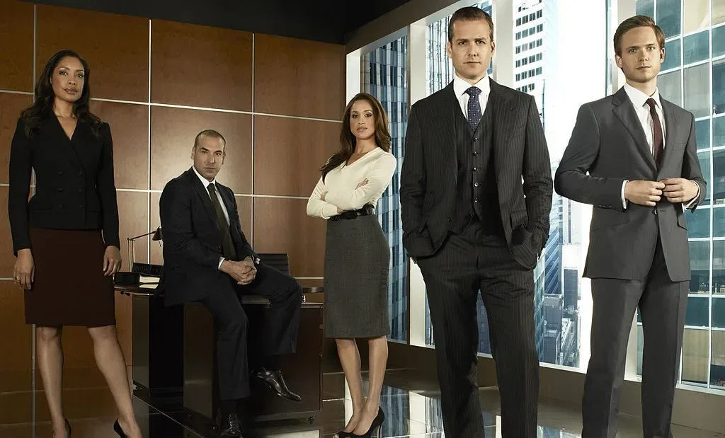 The Suits cast in a group promo