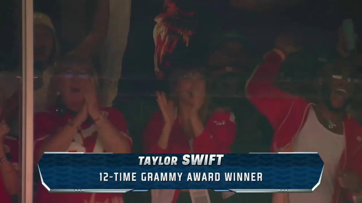 FOX's broadcast cuts to Swift, captioned as a 12-time Grammy winner