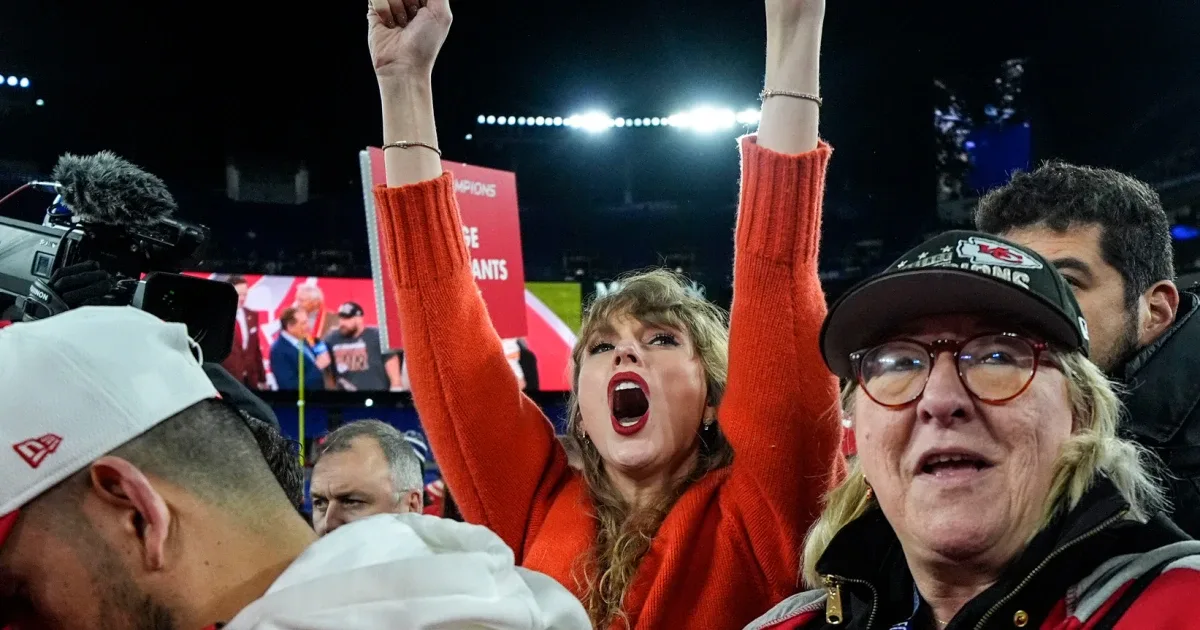 Swift celebrates in the stands at the AFC championship