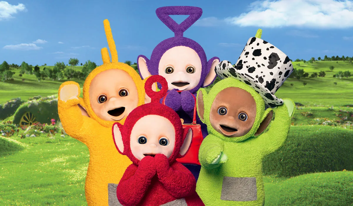 The four Teletubbies on the official series site; current promotional imagery, not the 1997 premiere.