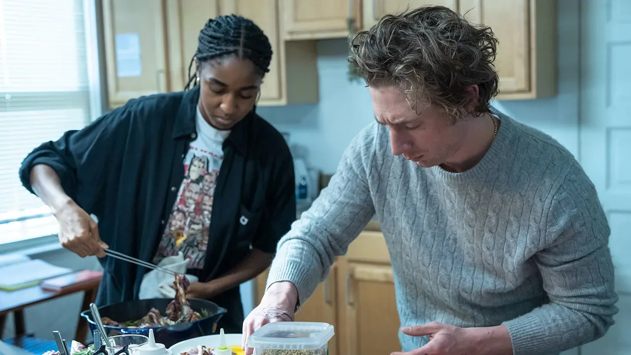 Carmy and Sydney cooking