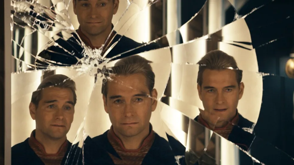 Antony Starr as Homelander, reflected in a shattered mirror.