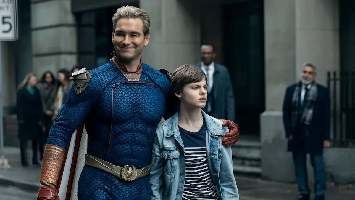 Homelander and his son Ryan on a city street.