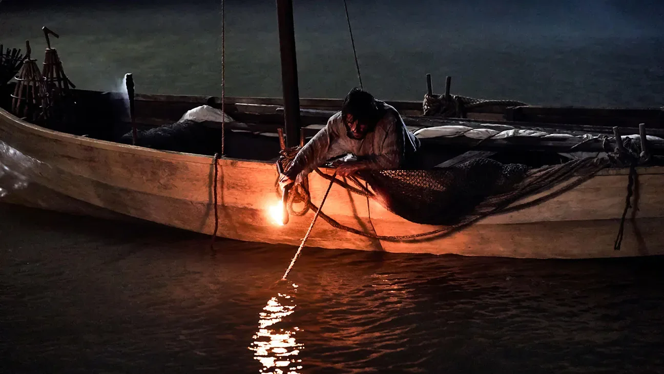 A fishing boat at night in The Chosen