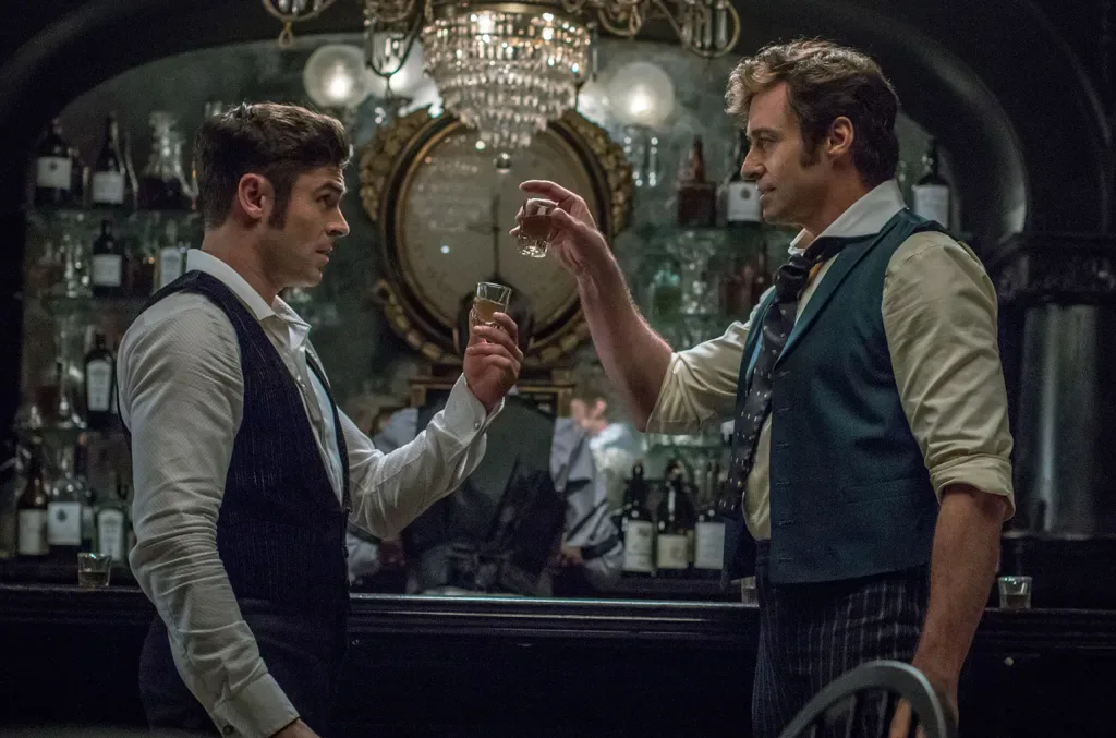 Hugh Jackman (P.T. Barnum) and Zac Efron (Philip Carlisle) star in Twentieth Century Fox’s "The Greatest Showman."