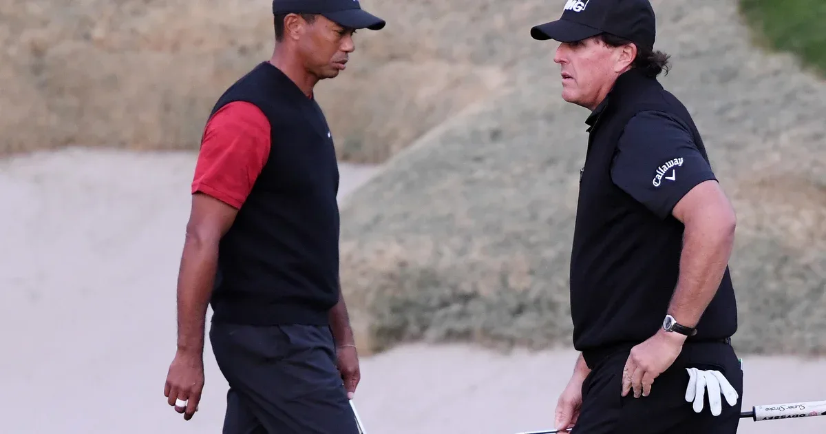 Tiger Woods and Phil Mickelson during The Match