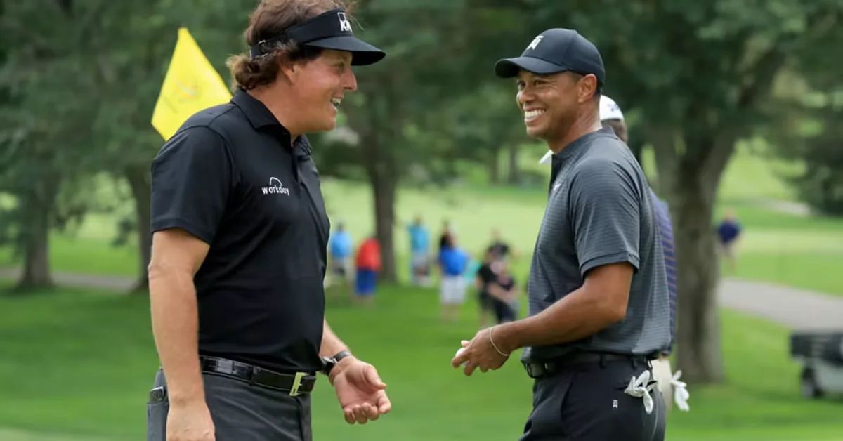 Phil Mickelson and Tiger Woods on the course
