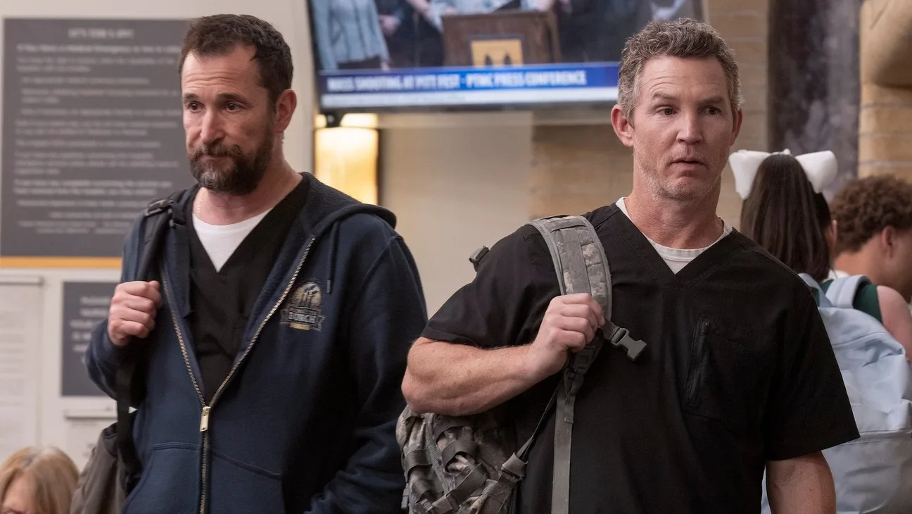 Noah Wyle's Dr. Robby and Shawn Hatosy's Dr. Abbot walking out of the hospital at the end of 'The Pitt's' first season finale.