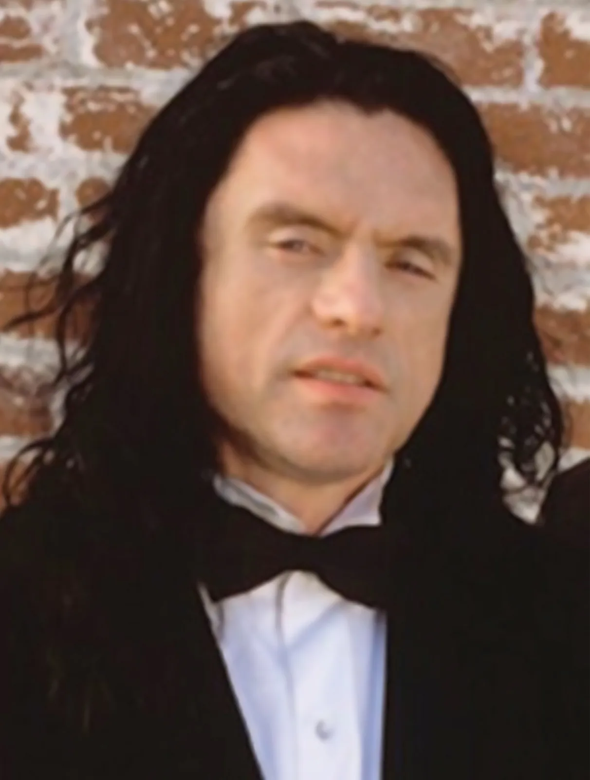 Tommy Wiseau as Johnny in a promotional photograph for The Room; CC0.