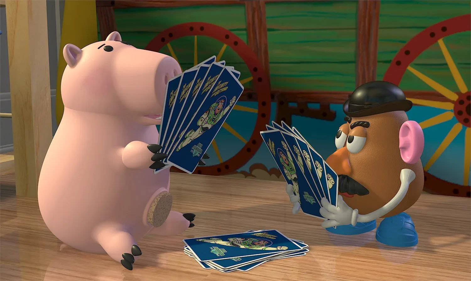 Hamm and Mr. Potato Head playing cards in Toy Story