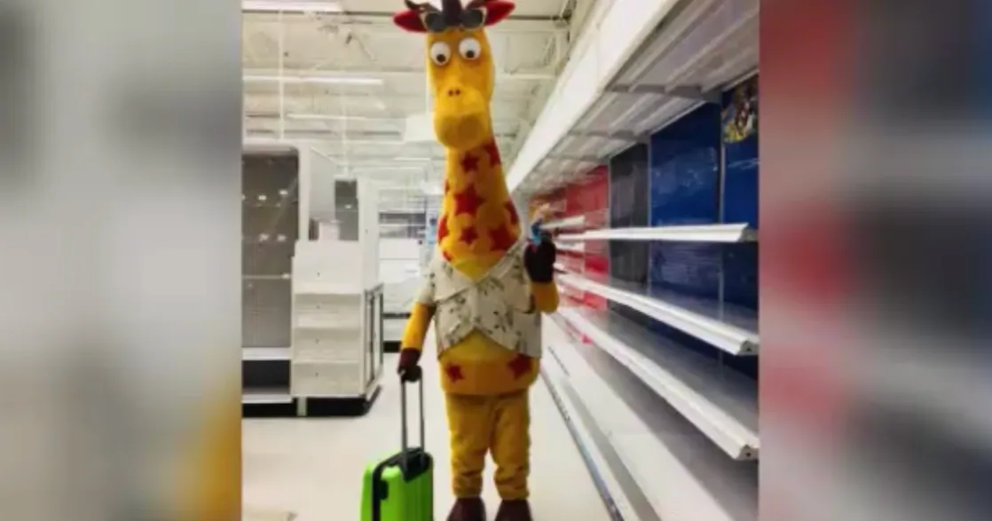 Geoffrey the Giraffe leaving an empty Toys "R" Us store